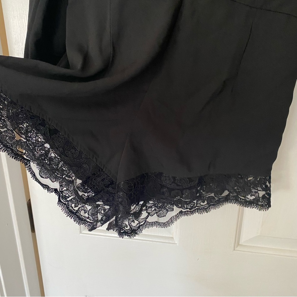 Black Kittenish long sleeve romper - Picture 2 of 8